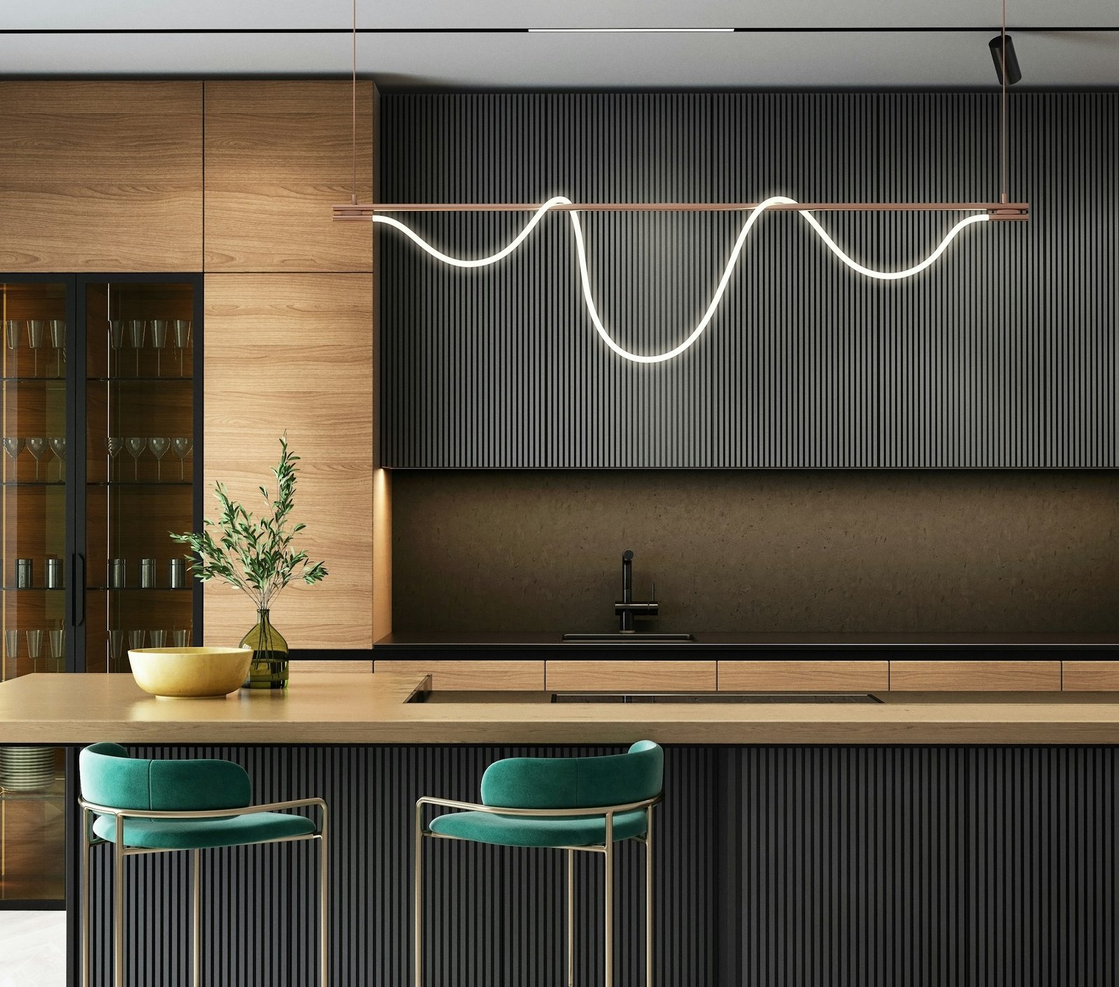 Modular kitchen with island and breakfast counter in Karachi apartment